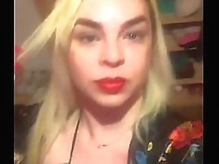 carol strips her white panties and caresses her hard shaved cock