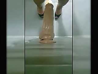 ladyboy playing with huge dildo