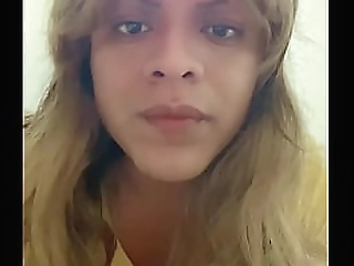 short-haired ladyboy with small tits strokes her small cock