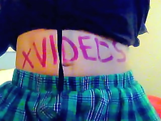 brunette ladyboy in red dress teases in her black lingerie and jerks off